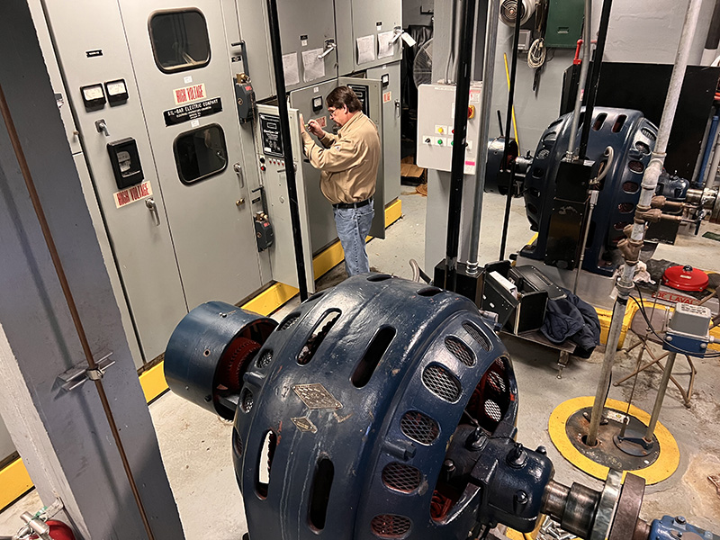 engineer performing a synchronous motor retrofit